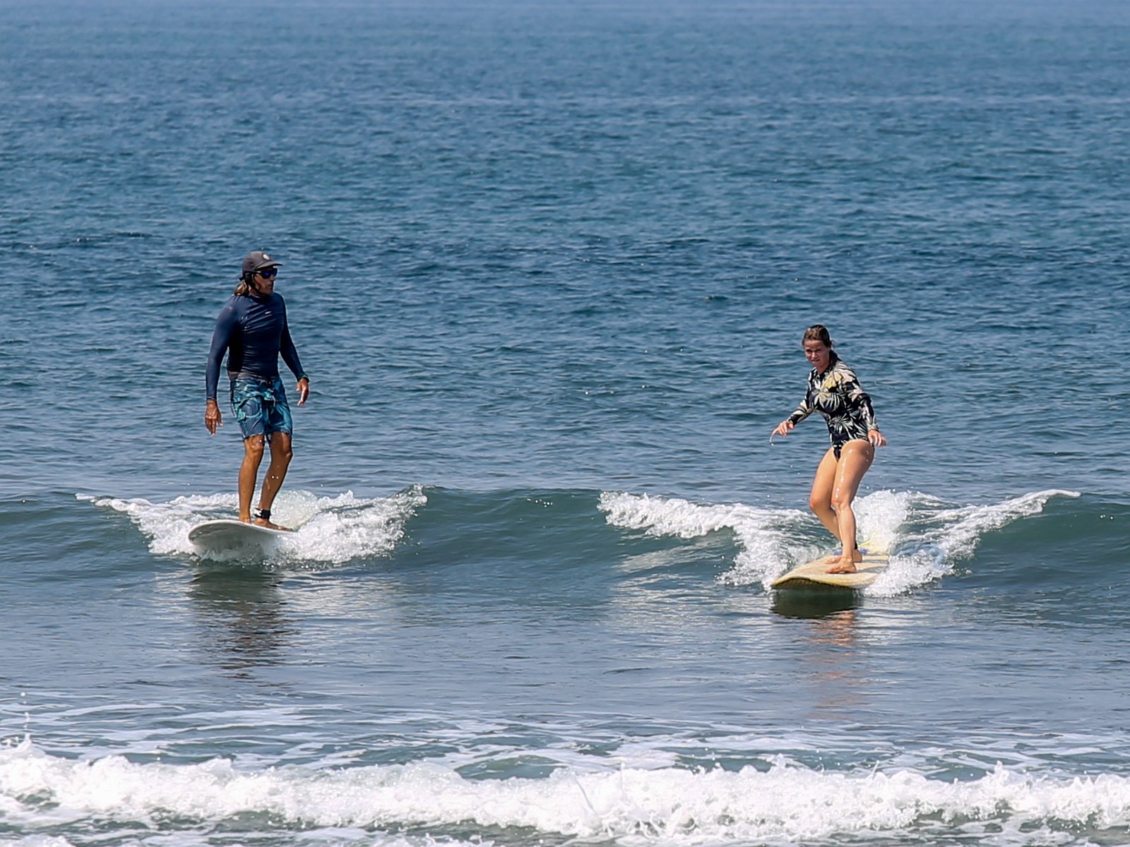 <span title="hello">Jaco Surfing Lessons</span>